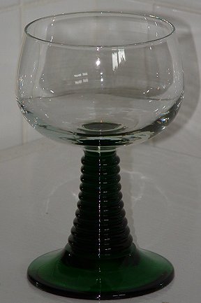 One of the six large Roemers
Green stem, clear bowl. Moulded mark: FRANCE on the base. 136mm high 80mm diameter
