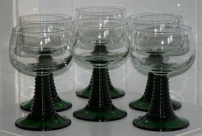 Six large  Roemers
Green stem, clear bowl. Moulded mark: FRANCE on the base. 136mm high 80mm diameter
