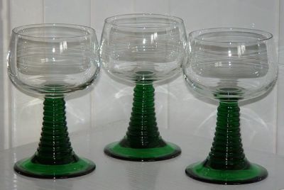 Three large Roemers
Green stems, clear bowls. Moulded mark: Luminarc FRANCE on the base. 136mm high 80mm diameter
