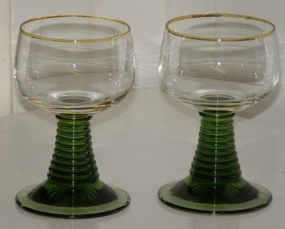 Pair of medium  Roemer - unknown maker
Olive stems, clear bowl with gilded rim. No makers mark. 106mm high, 63mm diameter.
