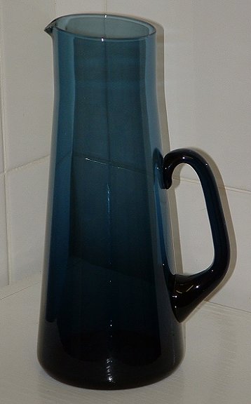 Indigo blue pitcher - side view
9.5" tall. Unknown maker. Flat bottom. Possibly Caithness
