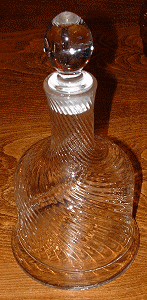 Rayware Spiral twisted bell-shaped decanter
Spirals twist to the left not the right like other twisted glassware I've seen. Suggested to be by IVV, Industria Vetreria Valdarnese, Italy [Source: Ivo Haanstra, Glass Message Board). Now identified as Rayware Made in Turkey by remains of dried-out label glue on the base of the decanter.
Keywords: Rayware