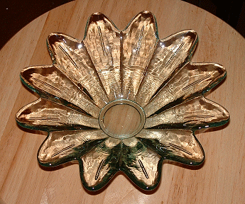 Unknown lotus shaped dish
Recycled glass (green tinged), contemporary, probably made in Spain
