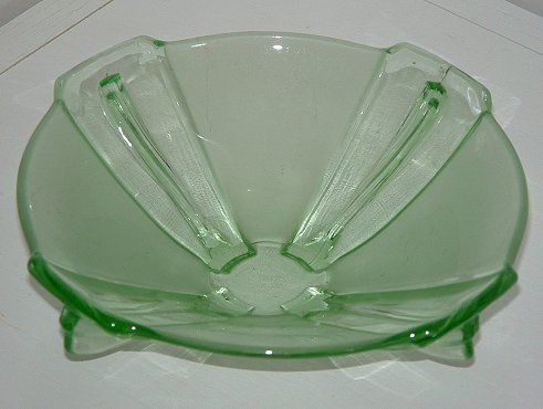 Stoelzle green winged bowl - top view
Unknown maker,  probably Czech

Now identified by Marcus Newhall on the GMB as Stoelzle, Hermannshutte, Czechoslovakia. 
GMB topic: [url]http://www.glassmessages.com/index.php/topic,20628.0.html[/url]

Keywords: pressed Czech Stoelzle Hermannshutte
