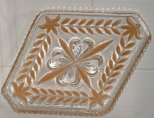 Sowerby "County" Dressing table tray
Gold painted highlighted design. In 1933 Sowerby catalogue
Keywords: Sowerby pressed England