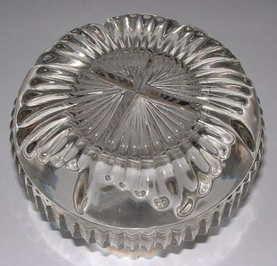Clear glass salt - base view
No maker's mark. Very heavy. Now known to be Molyneaux Webb pattern 343, thanks to Neil H's fab website: https://sites.google.com/site/molwebbhistory/Home/registered-designs/molineaux-webb-unregistered-pressed-glass/salts
Keywords: pressed