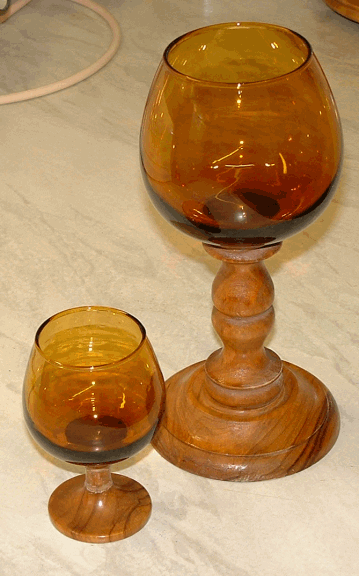 Brandy and Goblet
Amber glass bowl and wooden stem. Brandy is part of a set of six that came with the carousel (see elsewhere in this album). Large goblet is a one-off found shortly after the carousel set.
