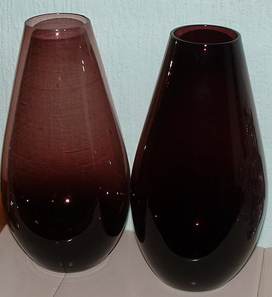 Unknown amethyst vases comparison
Graduated vase and dense vase side by side. Physically they are the same dimensions. 
