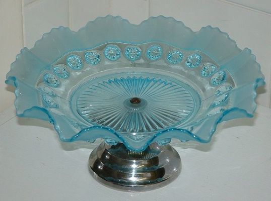 Davidson 269 blue cakestand
With chrome stand. 100mm high 225mm diameter
Keywords: Davidson pressed England