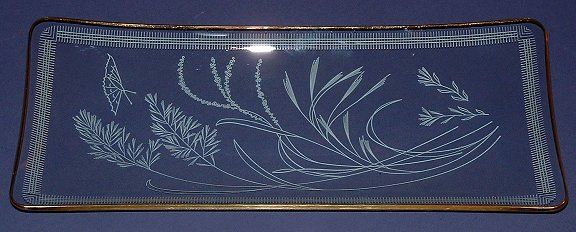 Glass sandwich tray
Oblong, 13.25" x 5.5" approx. 
Filigran-Glas from Heye-Glas 1999, Made in Germany
Keywords: Filigranglas slumped Germany