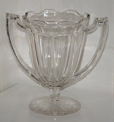 Trophy-style vase
Possibly US glass? This looks like a cross between Chippendale and the US Glass pattern 15309 called Betsy Ross.
Keywords: pressed