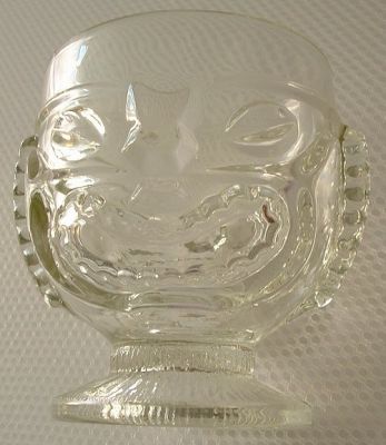 Unknown tiki dish - happy face
Possibly Ravenhead.
