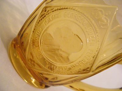 George VI & Elizabeth Coronation tankard dated 1937 in amber glass
Panel detail
Keywords: Sowerby pressed England coronation commemorative