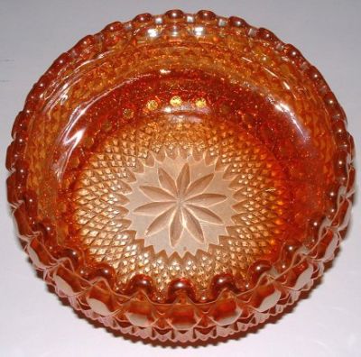 Sowerby 2266 Chunky (aka Hob and Button) carnival bowl - top
6 inches (150 mm) diameter. Identified by Glen Thistlewood and Tigerchips on the [url=http://glass-time.com/messages/viewtopic.php?p=34301]GMB[/url]
Keywords: Sowerby carnival pressed England